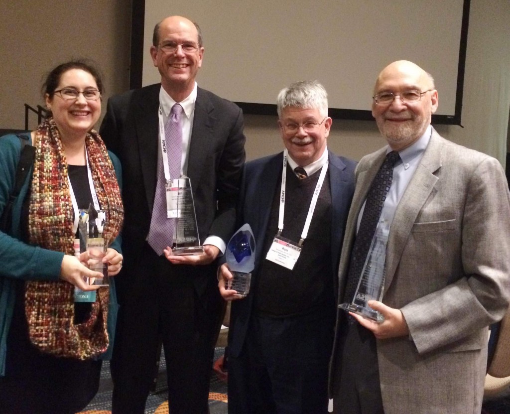 With their awards are, from left, Jordana Frost, Dr. Bill Sappenfield and Dr. Russ Kirby from USF, and Dr. Milt Kotelchuck from Harvard University.