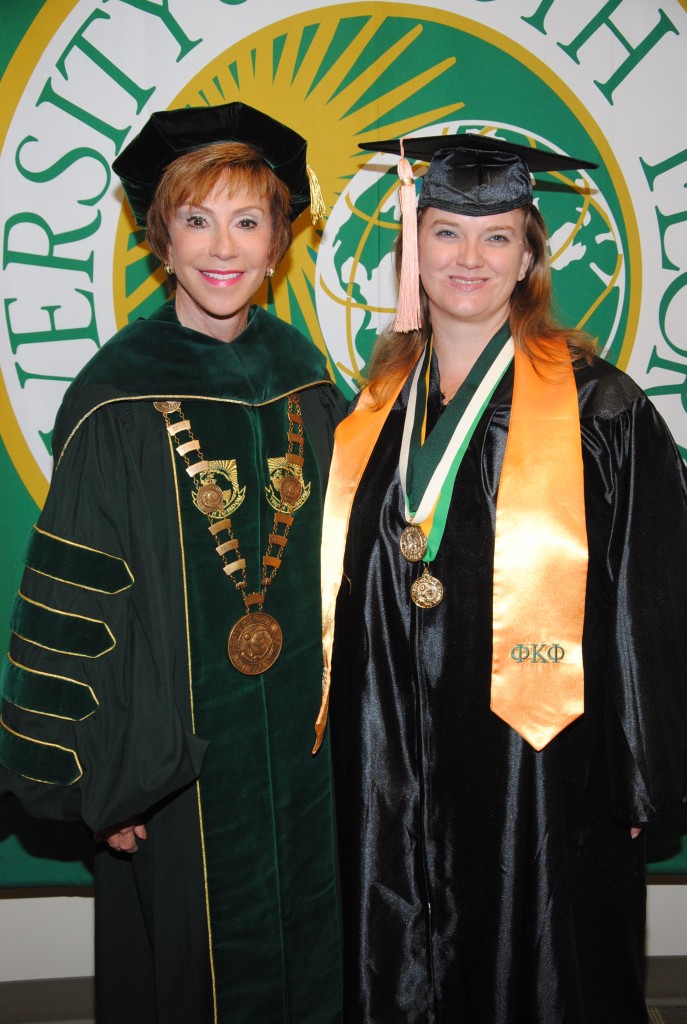 USF System President Judy Genshaft congratulates Mary Bigelow on graduating with a 4.0 GPA