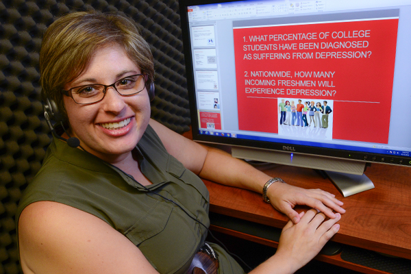 Alison Oberne, MA, MPH, CPH, an instructor in the USF College of Public Health, narrates a lecture for an undergraduate public health course using the recording space in COPH used for recording content for the lectures and modules of most of the College’s online degree programs.