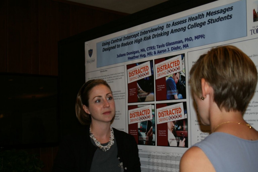 A student poster presentation at the conference