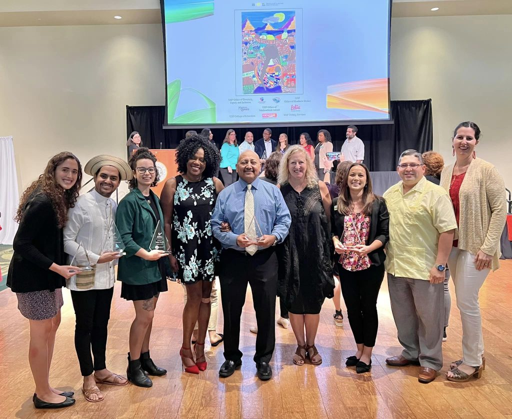 Dr. Tricia Penniecook (fourth from left) and Dean Donna Petersen (fourth from right) with COPH faculty, staff and students at the SoL Awards Ceremony.