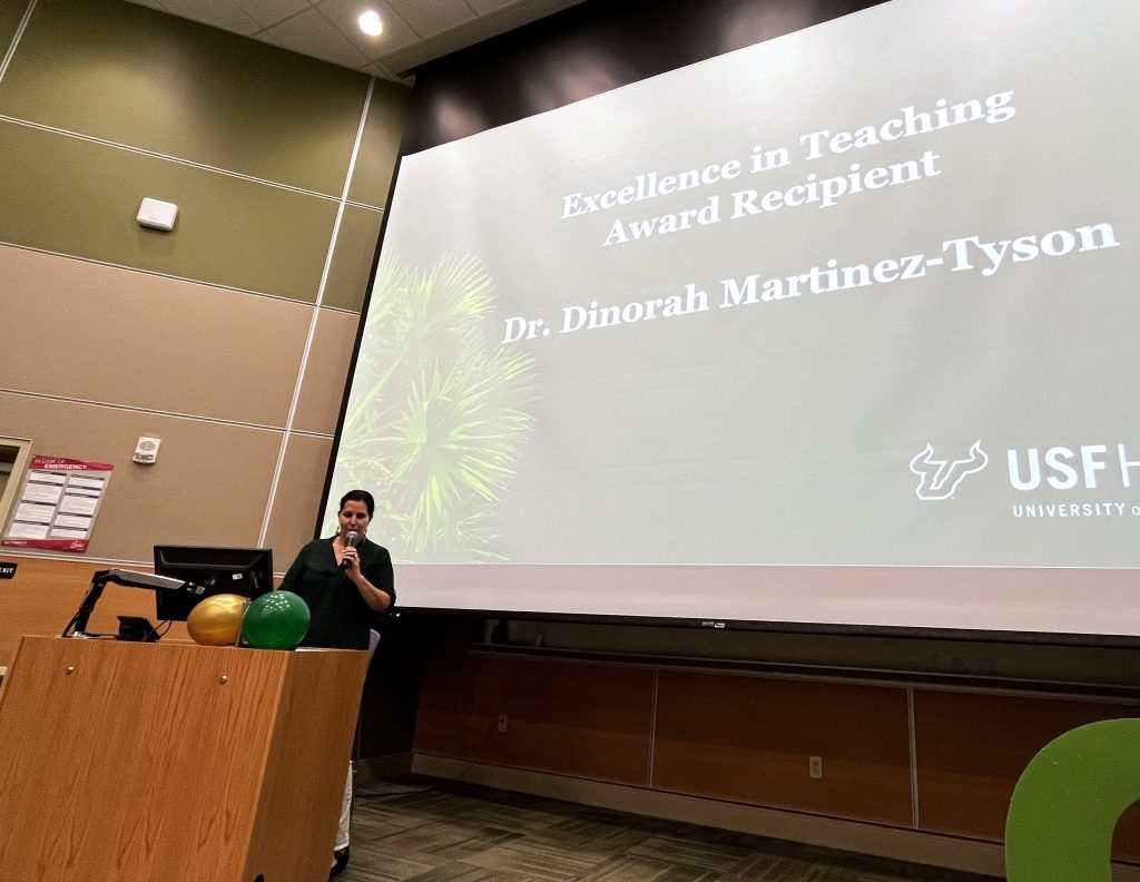 Dr. Dinorah Martinez Tyson speaking at the COPH graduate ceremony. (Photo by Caitlin Keough)