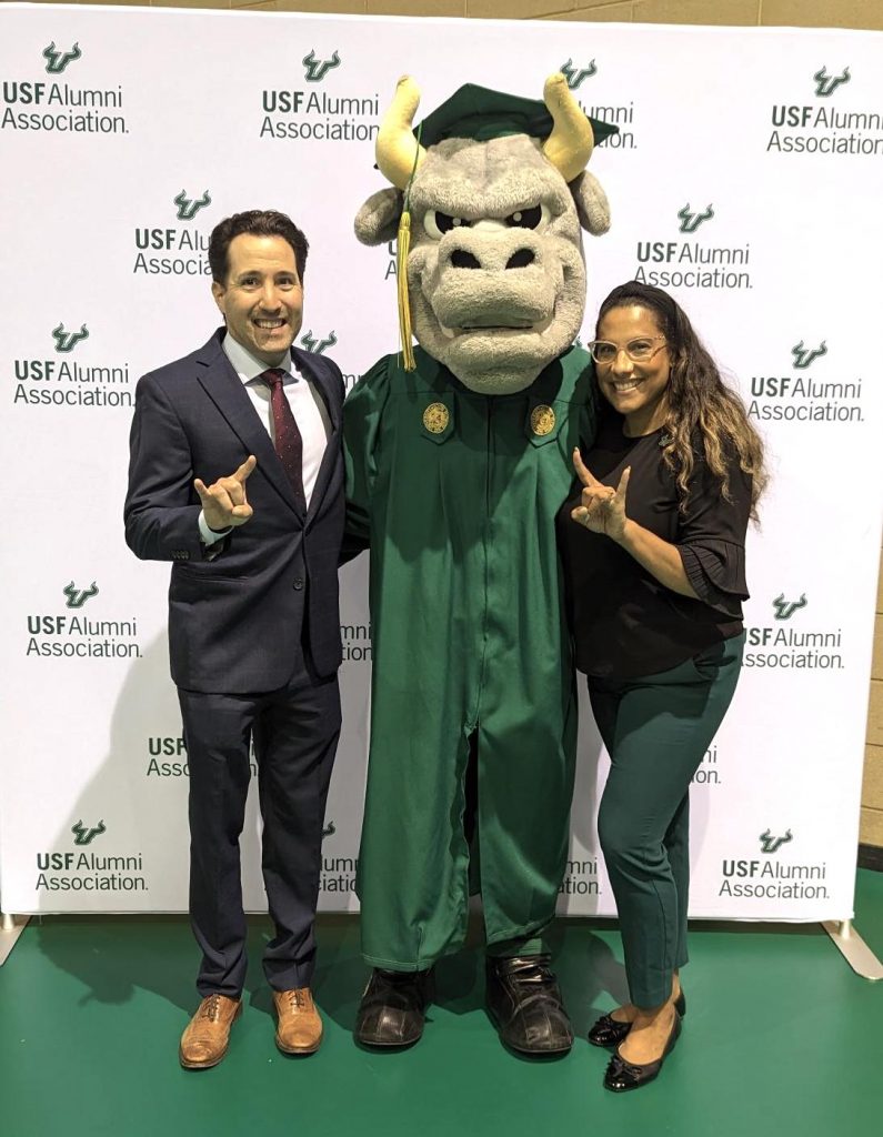 2023 COPH Excellence in Teaching awardee Patrick Rodriguez and Elissa Santos, assistant director of undergraduate advising, celebrating the 2023 spring graduates. (Photo courtesy of Rodriguez)