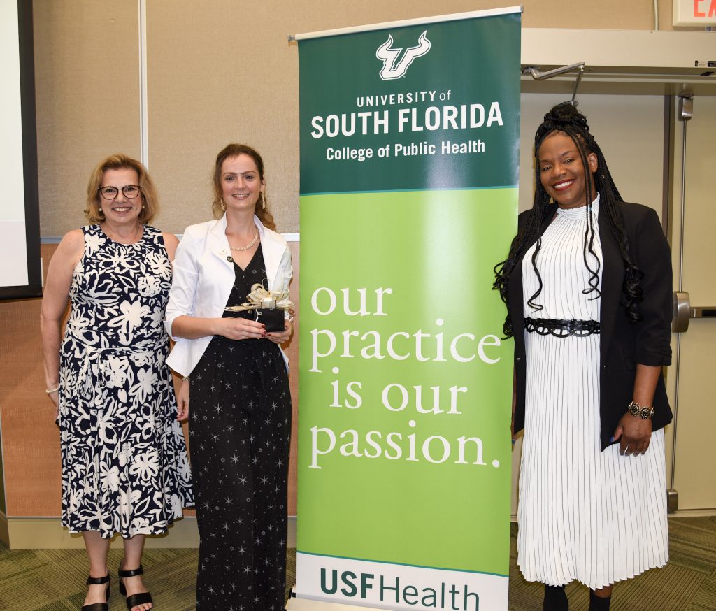 Natalia Babenko (middle) with Drs. Janice Zgibor and Tricia Penniecook at the COPH’s Graduate Celebration. (Photo by Caitlin Keough)