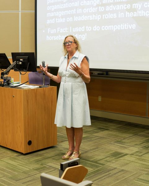 Dean Donna Petersen addressing students at the MHA Pinning Ceremony. (Photo by Koryo Photography).