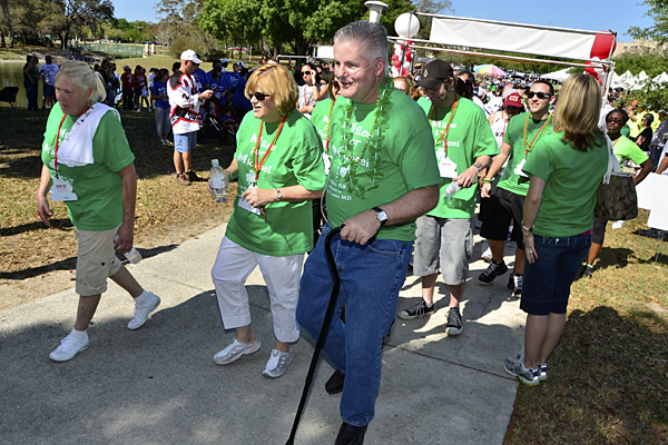 Dr. Michael Flannery begins the 2-mile route at Saturday's ALS Walk.