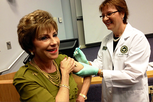 Judy Genshaft, Dianne Morrison-Beedy, flu shot drive, 2012, College of Public Health